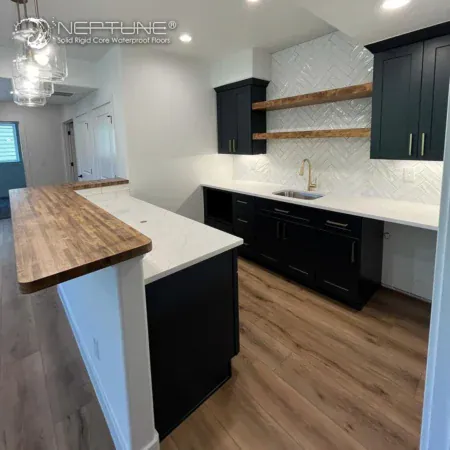 Bright, modern, and effortlessly stylish — this @timberlinecolorado project features the Durango from Neptune's MaXL collection. The rich, natural wood tones perfectly complement the crisp white walls and dark cabinetry, creating a balanced and welcoming space. With wide planks and a textured finish, this floor is built for everyday living while adding a touch of elegance.

Loving this look as much as we do? 🖤 

Floor used: https://www.neptune-flooring.com/ma-xl/durango/

#NeptuneFlooring #MaXLcollection #Durango #ModernLiving #FlooringInspo #US